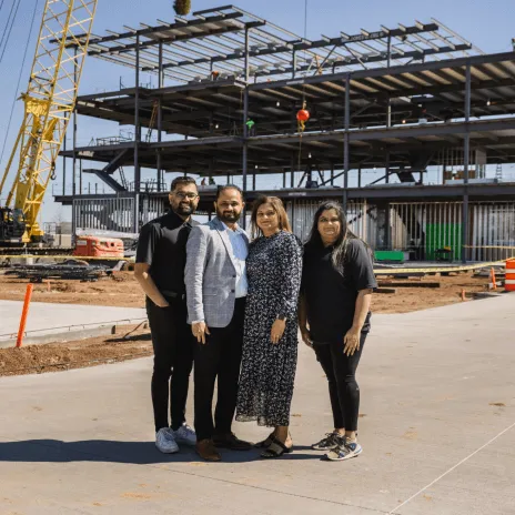 The Modi Capital family at a construction site